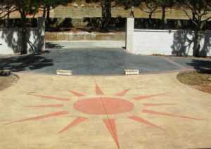 Artistic sun motif on ground