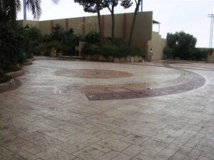 Curved pathway in garden courtyard