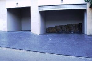 Two garages with concrete floor