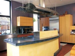 Modern kitchen with island and stainless appliances