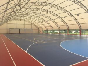 Indoor sports court with arched roof