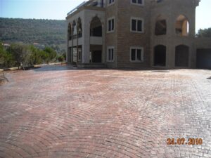 Expansive paved area with mountain view