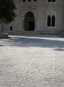 Stone courtyard with arched entrance