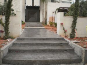 Concrete steps leading to modern building entrance