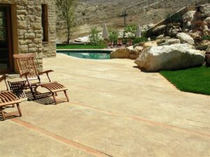 Outdoor pool area with lounge chairs