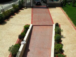 Elegant entrance with manicured landscaping