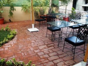 Outdoor patio with metal chairs and tables