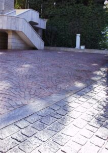 Stone driveway leading to staircase