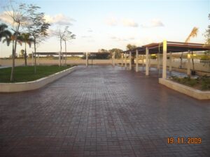 Large empty plaza under a cloudy sky