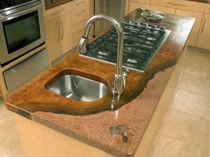 Stainless steel sink on brown countertop