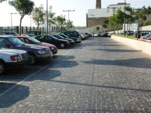 Empty parking lot with trees