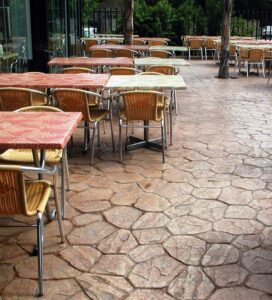 Restaurant terrace with tables and chairs
