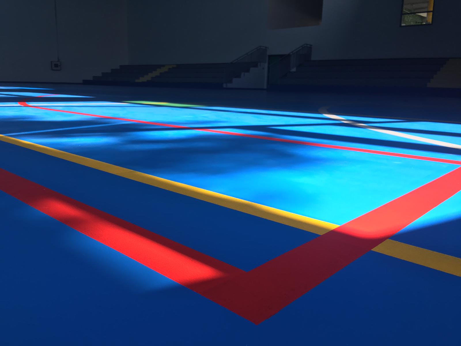 Indoor sports court with colorful lines