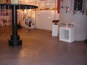 Contemporary art exhibit with hanging displays