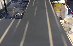 Freshly poured concrete slab drying