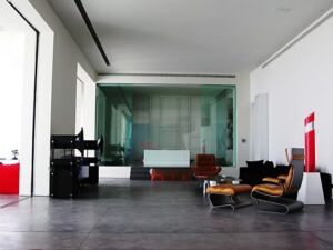 Spacious room featuring contemporary chairs