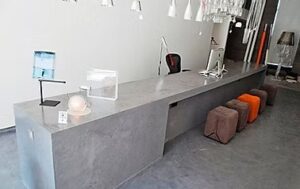Modern reception desk with stools