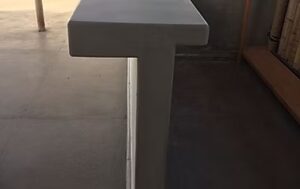 Concrete table with T-shaped design
