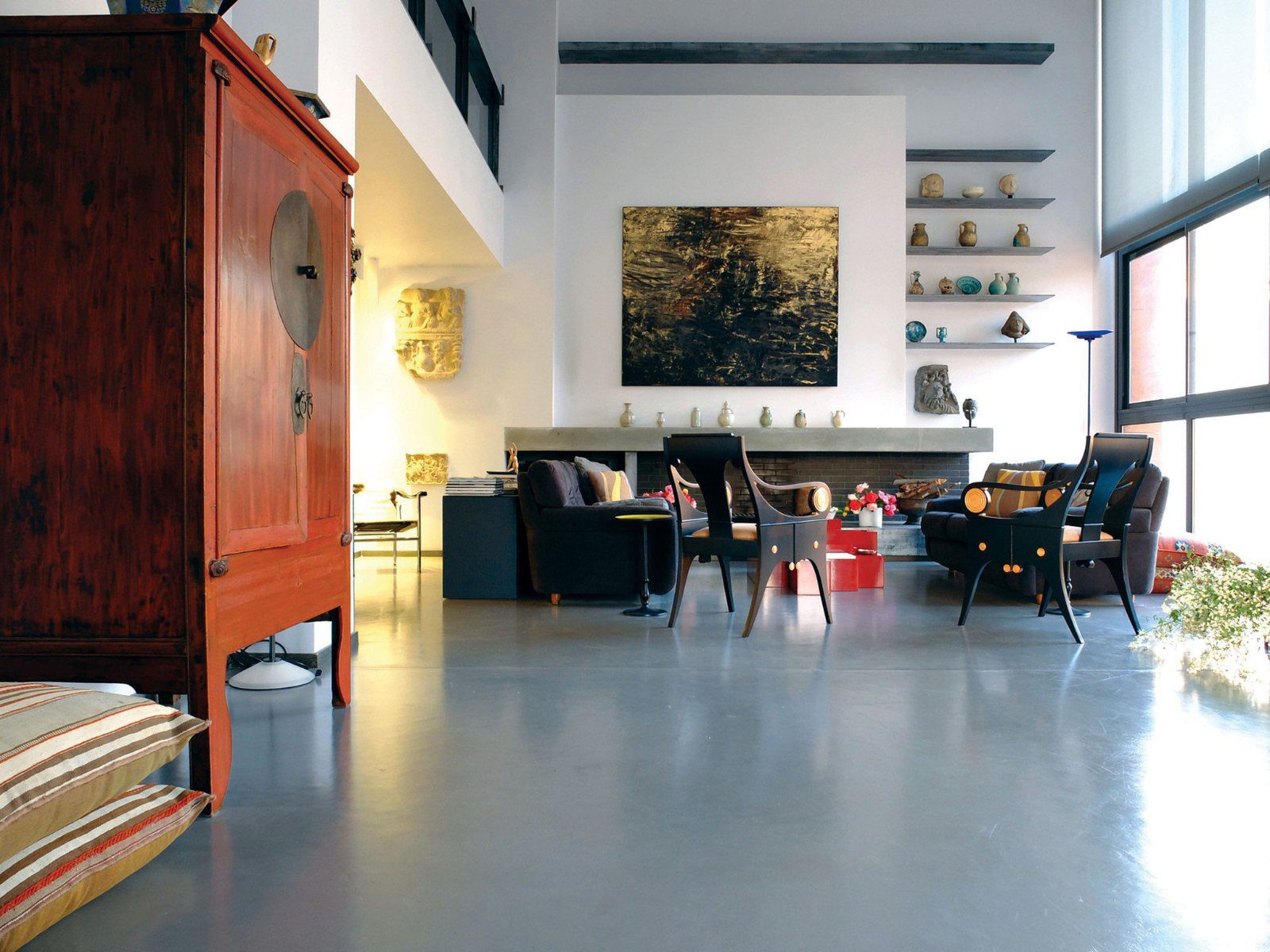 Grey MicroTop microtopping floor in a loft living room by TopCrete, Lebanon