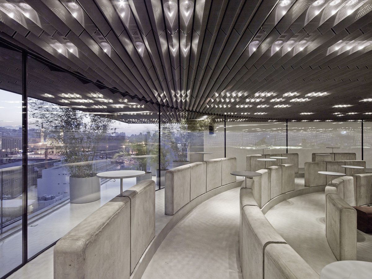 Seamless microtopping floor and concrete seating at a rooftop lounge in Lebanon