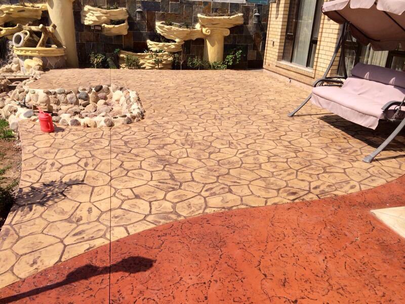 Stamped concrete garden patio in sand and terracotta tones, Lebanon