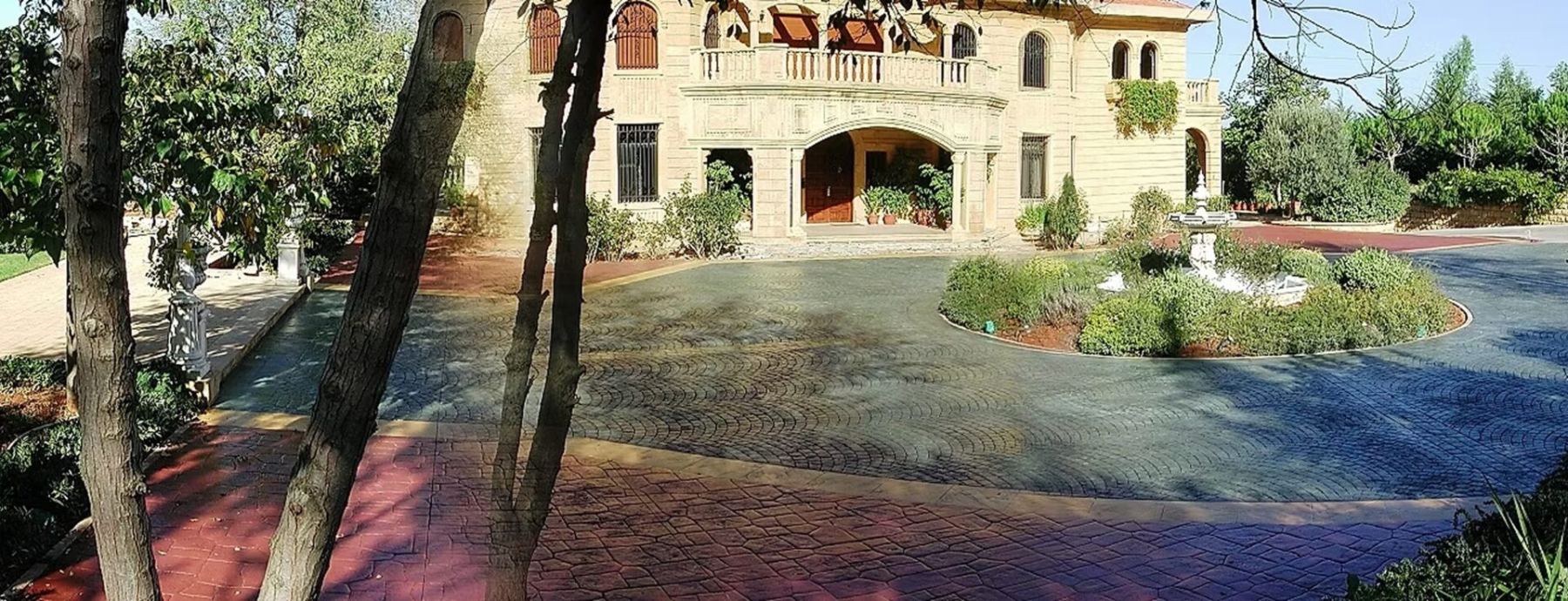 Elegant mansion with circular driveway